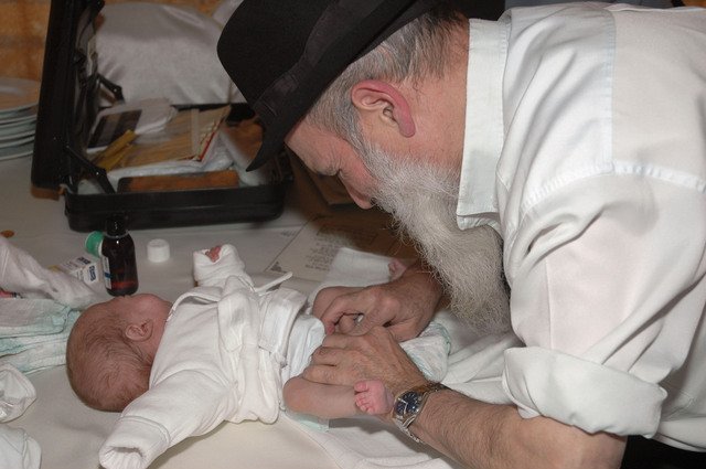 Wicked mohel cuts into the flesh of an innocent baby boy, permanently altering his body through genital mutilation.